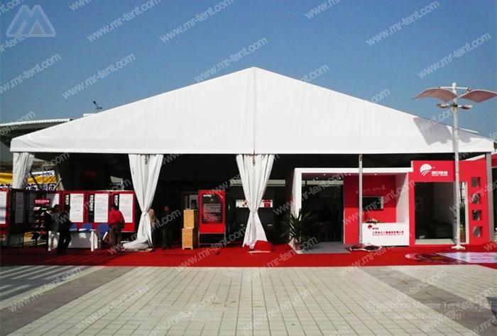 large house shaped trade show tent
